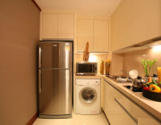 Fully equipped kitchen complemented by luxury Chinese silverware crockery and cooking ware